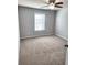 Bedroom featuring a ceiling fan and a window with blinds at 2571 Royston Dr, Duluth, GA 30097