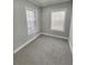 This bedroom has neutral paint and carpet, perfect for creating your personal space at 2571 Royston Dr, Duluth, GA 30097