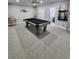 Finished basement with a billiard room perfect for relaxing and entertaining at 2571 Royston Dr, Duluth, GA 30097