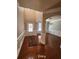 Bright foyer with hardwood floors, elegant molding, and high ceilings creating an inviting entrance at 2571 Royston Dr, Duluth, GA 30097