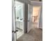Hallway leading to a bathroom with double vanity at 2571 Royston Dr, Duluth, GA 30097