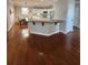 Open concept kitchen with granite counters, island seating, and stainless-steel appliances, blending style and functionality at 2571 Royston Dr, Duluth, GA 30097