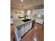 Spacious kitchen island with granite countertop and stainless steel dishwasher, perfect for meal preparation at 2571 Royston Dr, Duluth, GA 30097