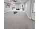 Spacious living room with a modern design, recessed lighting, and lots of open space at 2571 Royston Dr, Duluth, GA 30097