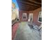 Outdoor patio with brick wall and seating at 2571 Royston Dr, Duluth, GA 30097