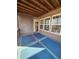 Inviting screened porch with stylish outdoor rug and view of natural scenery at 2571 Royston Dr, Duluth, GA 30097