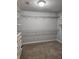 Large, empty walk-in closet ready to be customized with shelving and drawers at 2571 Royston Dr, Duluth, GA 30097