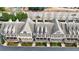 Aerial view showcasing townhomes with brick facades and manicured landscaping at 2368 Saint Davids Nw Sq # 4, Kennesaw, GA 30152