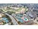 An aerial panorama of a golf course, tennis courts, and a pool, surrounded by a beautifully landscaped community at 2368 Saint Davids Nw Sq # 4, Kennesaw, GA 30152