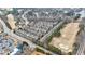 Aerial view of a townhome community near a golf course and pond at 2368 Saint Davids Nw Sq # 4, Kennesaw, GA 30152