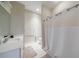 Cozy bathroom with white vanity, shower-tub combo, and tiled floors at 2368 Saint Davids Nw Sq # 4, Kennesaw, GA 30152