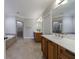 Elegant bathroom with double sink vanity, tiled floor, soaking tub, and glass shower at 2368 Saint Davids Nw Sq # 4, Kennesaw, GA 30152