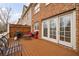 Cozy deck with outdoor seating, a grill, and a view, an ideal space for outdoor dining and relaxation at 2368 Saint Davids Nw Sq # 4, Kennesaw, GA 30152