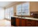Kitchen with granite countertops, stainless steel appliances, hardwood floors, and natural light at 2368 Saint Davids Nw Sq # 4, Kennesaw, GA 30152