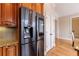 Modern kitchen with a stainless steel refrigerator and granite countertops at 2368 Saint Davids Nw Sq # 4, Kennesaw, GA 30152