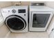 Laundry machines featuring the latest technology, situated on light tiled flooring at 2368 Saint Davids Nw Sq # 4, Kennesaw, GA 30152