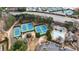 Overhead shot of well-kept tennis courts and a sparkling pool within a beautifully landscaped community at 2368 Saint Davids Nw Sq # 4, Kennesaw, GA 30152