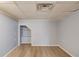 Carpeted basement rec room with drop ceiling and a small closet space for extra storage at 3625 Knoll Crest Trl, Buford, GA 30519