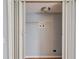 Laundry room with folding accordion doors and washer/dryer hookups for convenient laundry days at 3625 Knoll Crest Trl, Buford, GA 30519