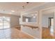 Open concept living and dining with sliding door and tile flooring at 3625 Knoll Crest Trl, Buford, GA 30519