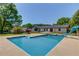 Enjoy the beautiful pool, diving board, and slide in this backyard oasis at 3625 Knoll Crest Trl, Buford, GA 30519