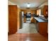 Kitchen boasts stainless steel appliances and abundant wood cabinets and granite countertops at 9033 Greystone Rd, Jonesboro, GA 30238