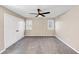 Bedroom with neutral walls, new carpet, ceiling fan, and a spacious closet at 3017 Lana Ln, Marietta, GA 30066