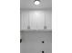Laundry room features white cabinets and modern fixtures at 3017 Lana Ln, Marietta, GA 30066