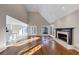 Bright living room with fireplace, vaulted ceilings, and hardwood floors at 3017 Lana Ln, Marietta, GA 30066