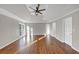Spacious main bedroom featuring hardwood floors, tray ceiling, and plenty of natural light at 3017 Lana Ln, Marietta, GA 30066