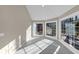Bright sunroom features tile floors and large windows, allowing ample natural light and views of the outdoors at 3017 Lana Ln, Marietta, GA 30066