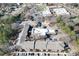 Expansive aerial view of the complex showcasing its layout, parking, and nearby amenities at 475 Mount Vernon Ne Hwy # A-102, Sandy Springs, GA 30328