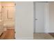 Bathroom with a sink, shower, and hardwood flooring at 475 Mount Vernon Ne Hwy # A-102, Sandy Springs, GA 30328