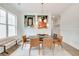 Modern dining room with contemporary light fixture and stylish chairs at 603 Old Peachtree Ne Rd, Lawrenceville, GA 30043