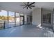 Relaxing screened porch with view of the fenced backyard at 725 First Cotton Dr, Powder Springs, GA 30127