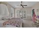 Charming bedroom with french doors, walkout balcony, and cute decor at 1421 Hedgewood Nw Ln, Kennesaw, GA 30152