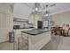 Well-equipped kitchen featuring a center island with black countertop and ample cabinet space at 1421 Hedgewood Nw Ln, Kennesaw, GA 30152