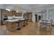 Beautiful kitchen featuring a large center island with seating, custom cabinetry, and stainless steel appliances at 1421 Hedgewood Nw Ln, Kennesaw, GA 30152