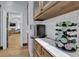 Butler's pantry with countertop and access to living area at 1421 Hedgewood Nw Ln, Kennesaw, GA 30152
