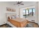 Bedroom featuring a window with a view of the city skyline, and an area rug at 3060 Pharr Court North Nw # 619, Atlanta, GA 30305