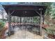 Outdoor community gazebo featuring benches and a table with chairs at 3060 Pharr Court North Nw # 619, Atlanta, GA 30305