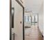 Living room featuring hardwood floors, ceiling fan, modern lighting, and city views at 3060 Pharr Court North Nw # 619, Atlanta, GA 30305