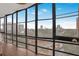 Sunroom featuring large windows with a view of the city and surrounding landscape at 3060 Pharr Court North Nw # 619, Atlanta, GA 30305