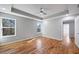 A bedroom featuring recessed lights, a ceiling fan, windows and hardwood floors at 3200 Tackett Rd, Douglasville, GA 30135