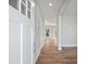 Inviting foyer with hardwood floors and a view into the bright and open floor plan at 3200 Tackett Rd, Douglasville, GA 30135