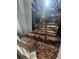 Outdoor patio covered in leaves at 4707 Mariners Way, Stone Mountain, GA 30083