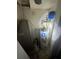 A hot water tank and heater are in a small utility area; the tank appears to have some rust or aging at 4707 Mariners Way, Stone Mountain, GA 30083