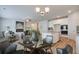 Open-concept living space with kitchen and dining, perfect for modern living and entertaining at 1856 Kingsmere Run Dr, Loganville, GA 30052