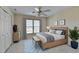 This bedroom offers style and comfort, complete with coordinated decor and ample natural light at 1921 Harvest Way, Loganville, GA 30052