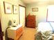 Comfortable bedroom with dresser and plush bedding at 25 Chestnut Ridge Ne Dr, Cartersville, GA 30121